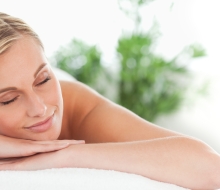 Close up of a woman lying on a lounger having a massage